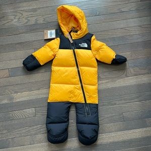 The Northface hooded one piece yellow snow suit. NWT.